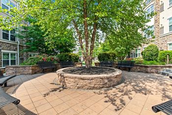 Outdoor Patio Seating Area at Heights at Glen Mills Apartments in Glen Mills, PA 19342
